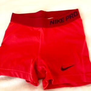 NIKE Pro 3” training shorts, red/orange